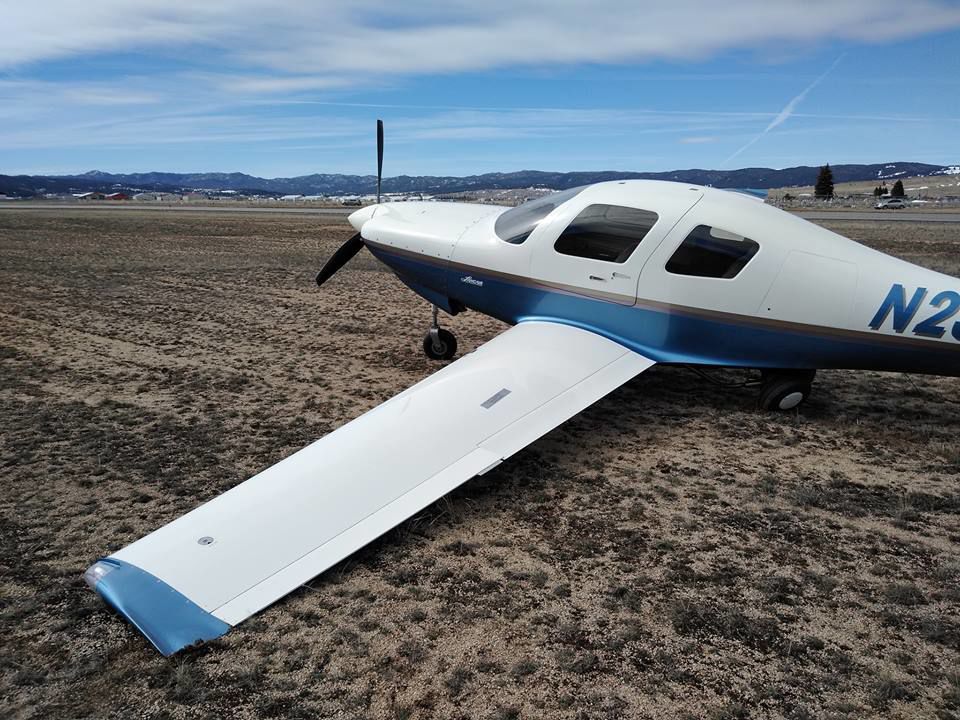 Aircraft lands in grass